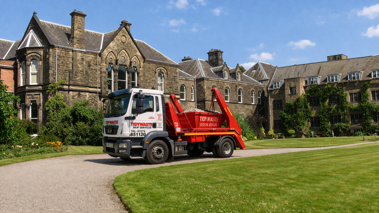 TidyWaste Skip Hire Vehicle next to The Mirfield Monastery in Mirfield